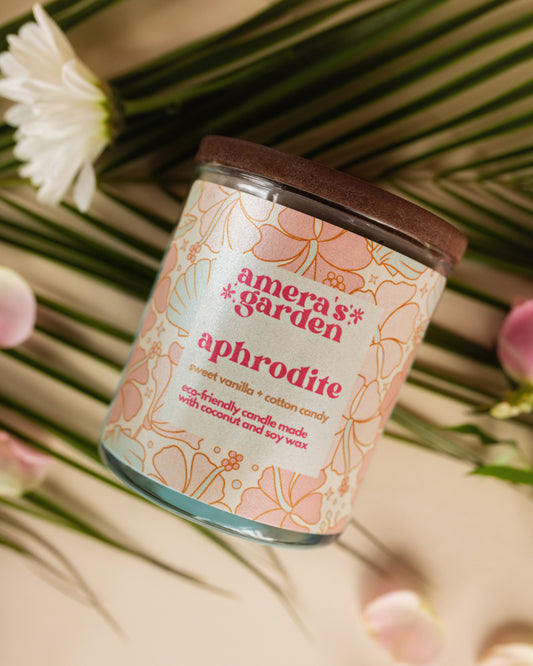 aphrodite candle laid on flowers